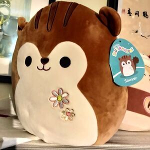 Squishmallow Sawyer the brown squirrel with embedded flowers on stomach 12 inch